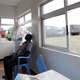 A Kenyan ministry of health medical worker tests a truck driver for Covid-19 on May 12.